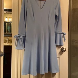 Light blue dress, it’s sized a 6, fits like an 8